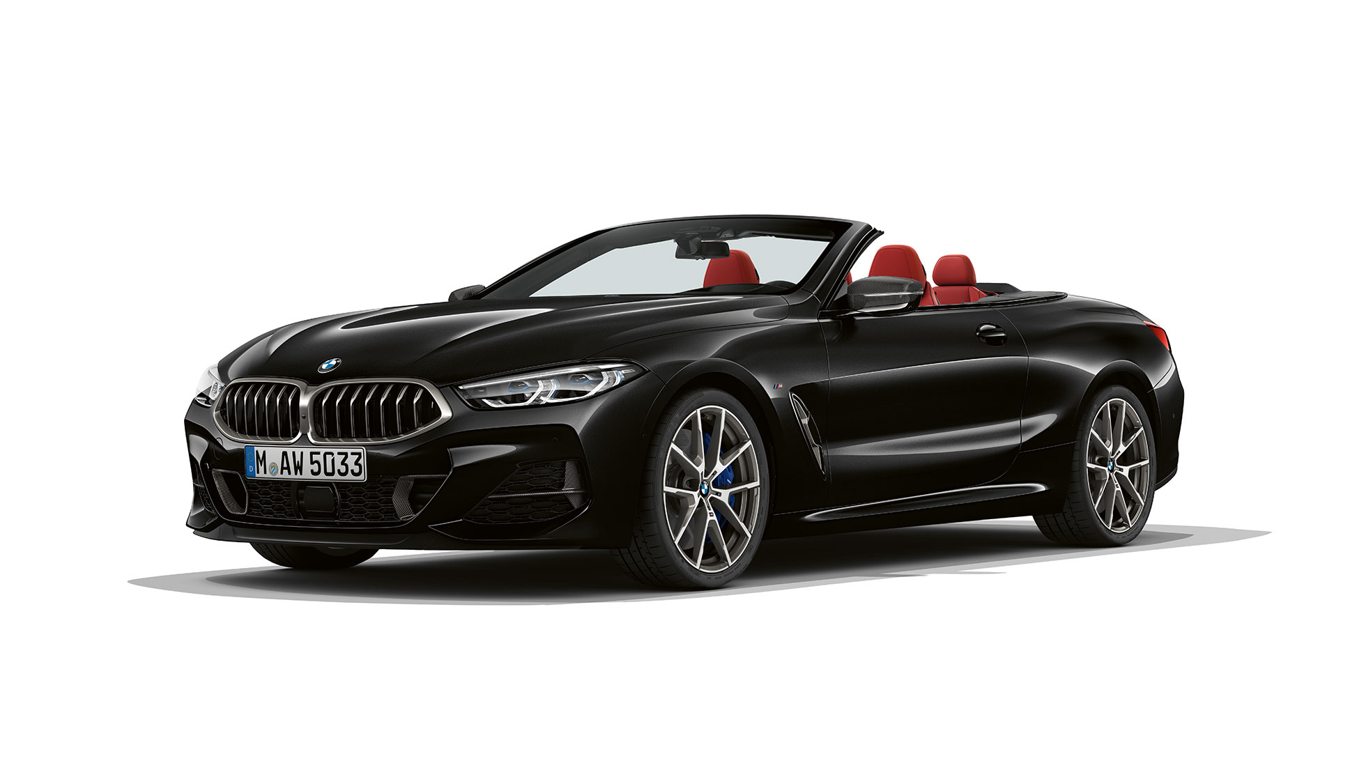 BMW M850i xDrive, Carbon Black metallic, three-quarter view front.